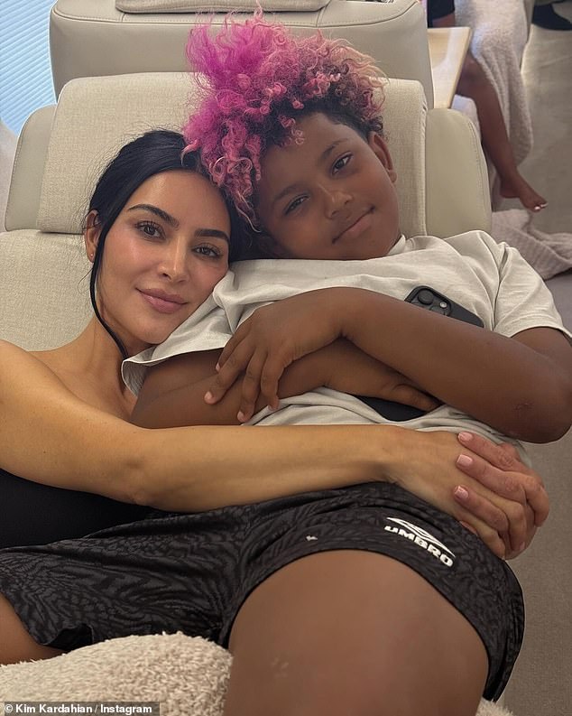 Kim treated her as well as younger sister Khloe's kids to a very lavish getaway to Cabo San Lucas, Mexico  (pictured with son Saint, nine)