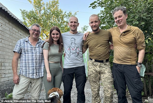 Richard Pendlebury (far right) and photographer Jamie Wiseman (far left) with, from left, Daria, fixer Olex and Ukrainian soldier Makar