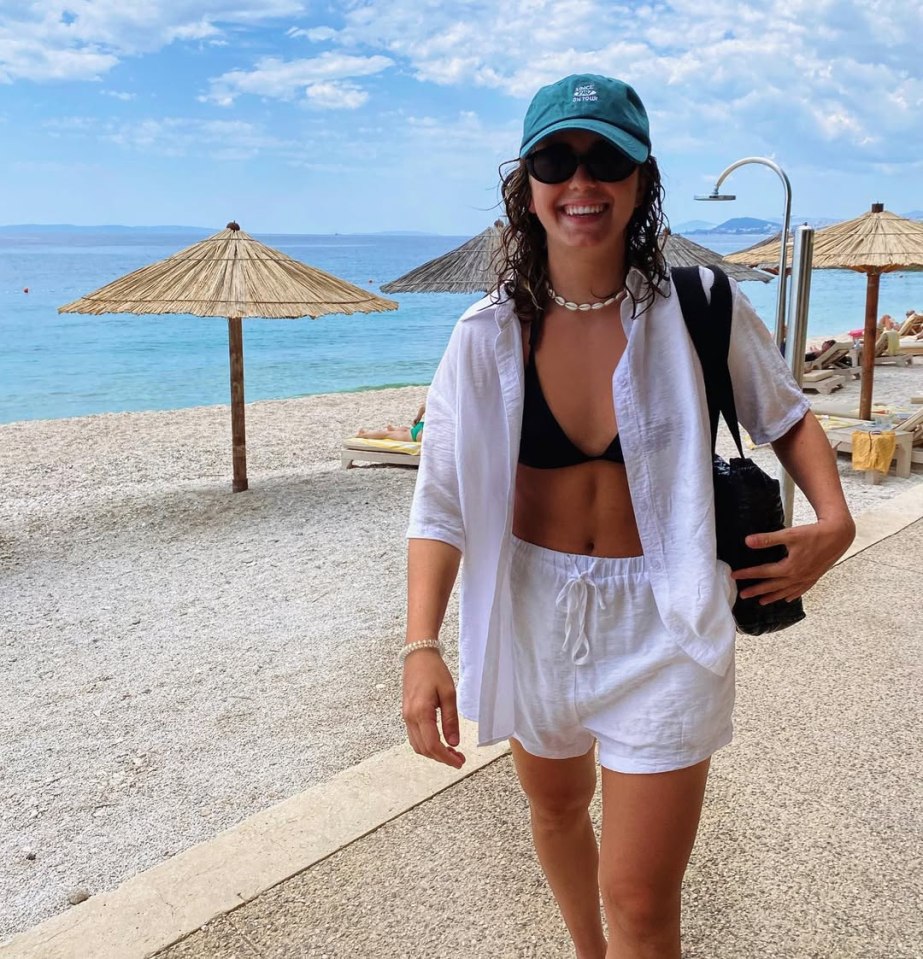 Kiki Markovic on a beach.