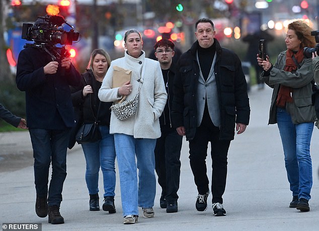 Caroline Darian and David, the children of Gisele Pelicot, arrive to attend the verdict at the courthouse in Avignon, France, December 19, 2024