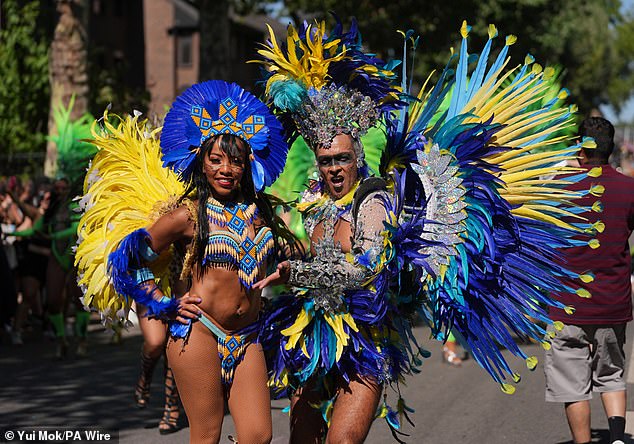 Dancers performing during the Notting Hill Carnival celebration in west London over the Summer Bank Holiday weekend