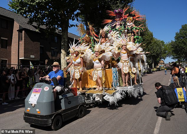 A colourful display of people during the Notting Hill Carnival on Monday
