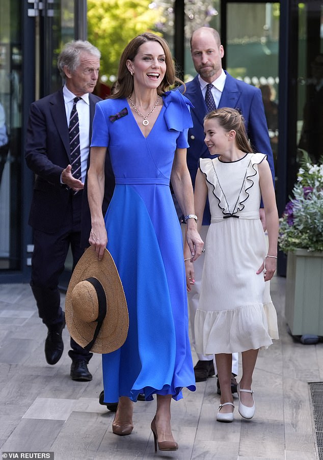She also spent time in the sun during Wimbledon tennis tournament in July