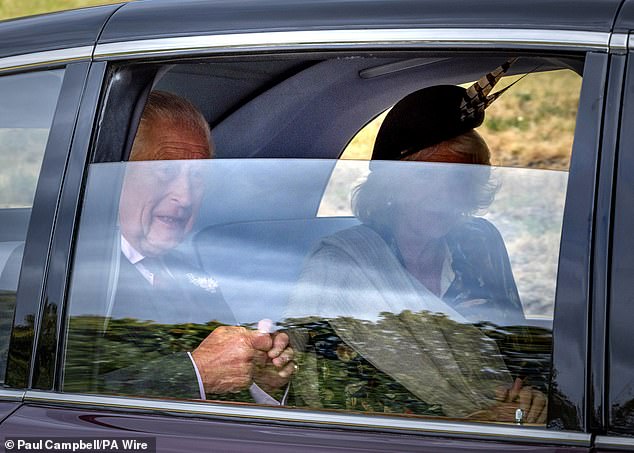 At one point, the King and Queen rolled down their window slightly and Queen Camilla appeared to look directly at the camera whilst the monarch was in the middle of a sentence