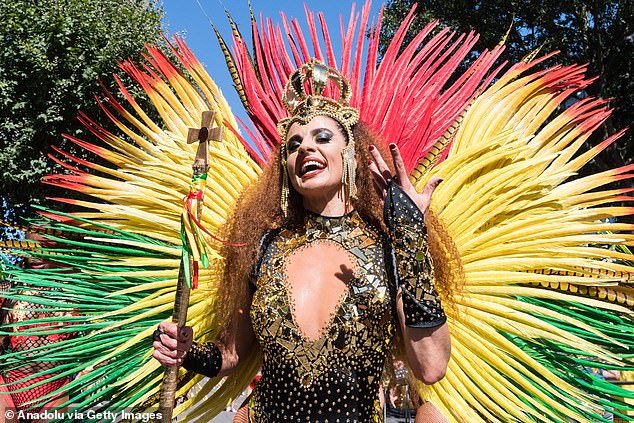 The largest street party in Europe officially begun on Sunday morning with dancers in bright costumes parading along the streets