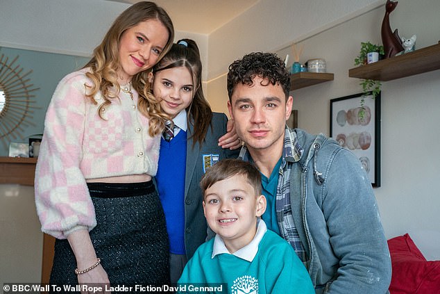 Adam is pictured in his role as Donte Charles in Waterloo Road with his son Teddy (bottom) and niece Scarlett (middle) playing his children with Katie Griffiths as Choe Charles