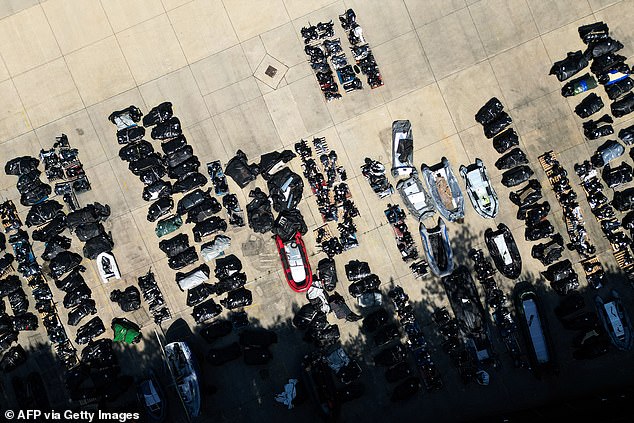 An aerial photograph shows inflatable dinghies and outboard engines believed to have been used by migrants to cross the channel and stored in a Port Authority yard in Dover, south-east England, on August 17, 2025