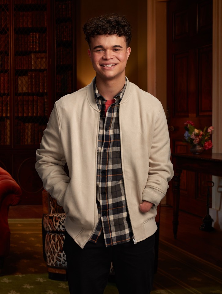 Portrait of a smiling young man with one arm.