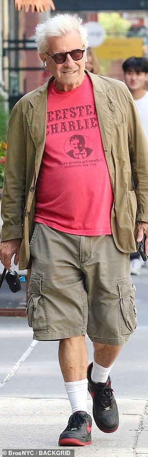 He kept it comfortable for the trek with Nike trainers