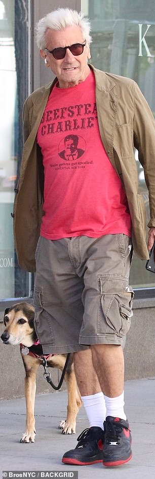His eyes were shielded behind a pair of sunglasses