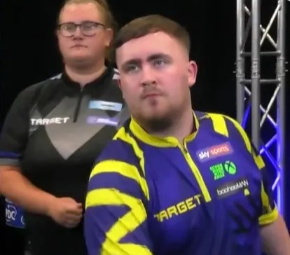 Beau Greaves at a darts tournament.