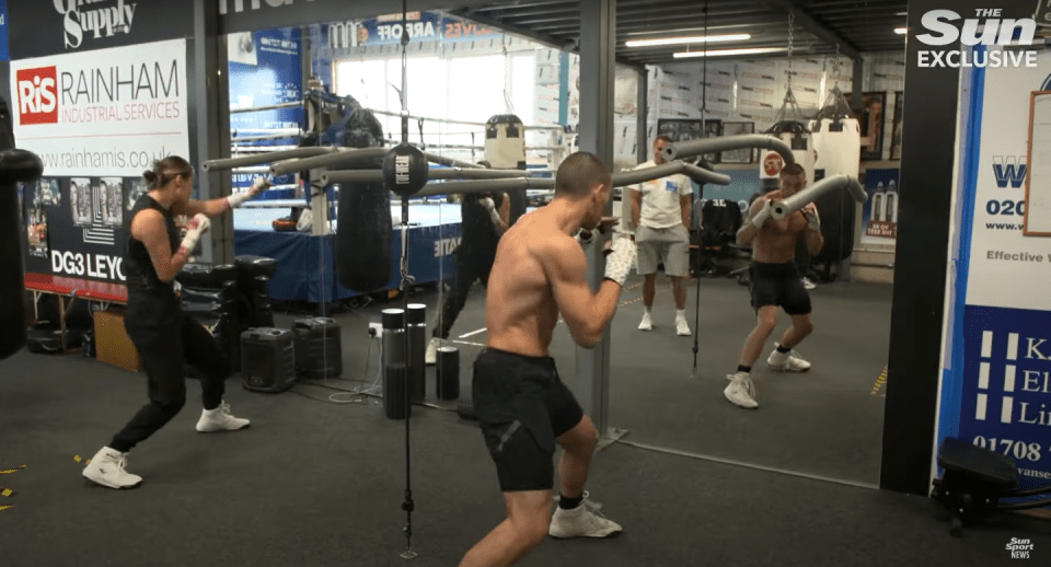 Boxers training in a gym.