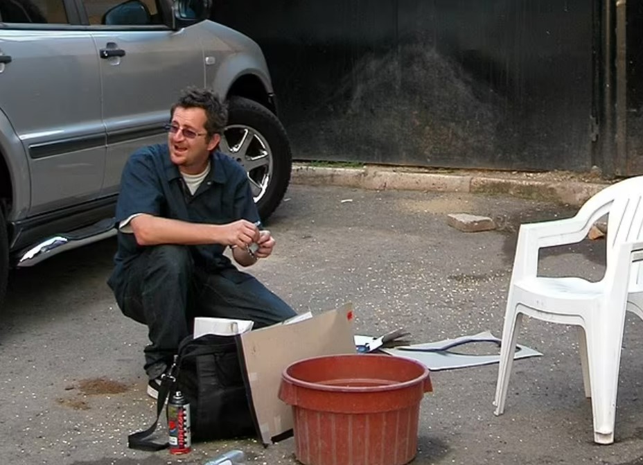 Believed to be Robin Gunningham, aka Banksy.