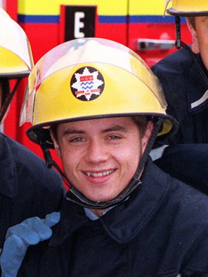 Headshot of John Alford in firefighter uniform.