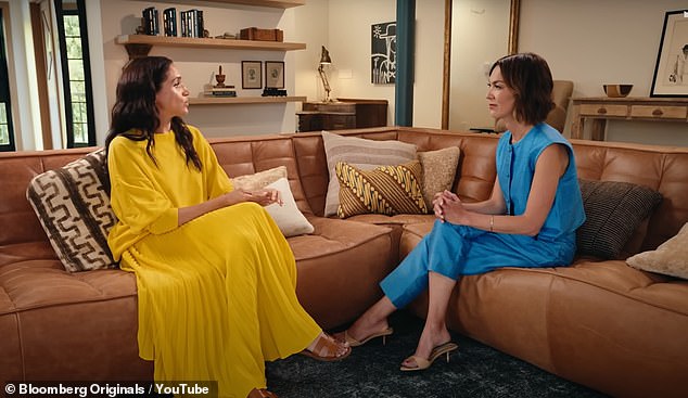 While speaking to Bloomberg's Emily Chang over smashed burgers and pints of beer, Meghan is asked if there is an 'inherent tension' between 'trying to be relatable' while also being a Duchess