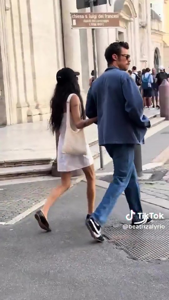 Harry Styles and Zoe Kravitz walking in Rome.