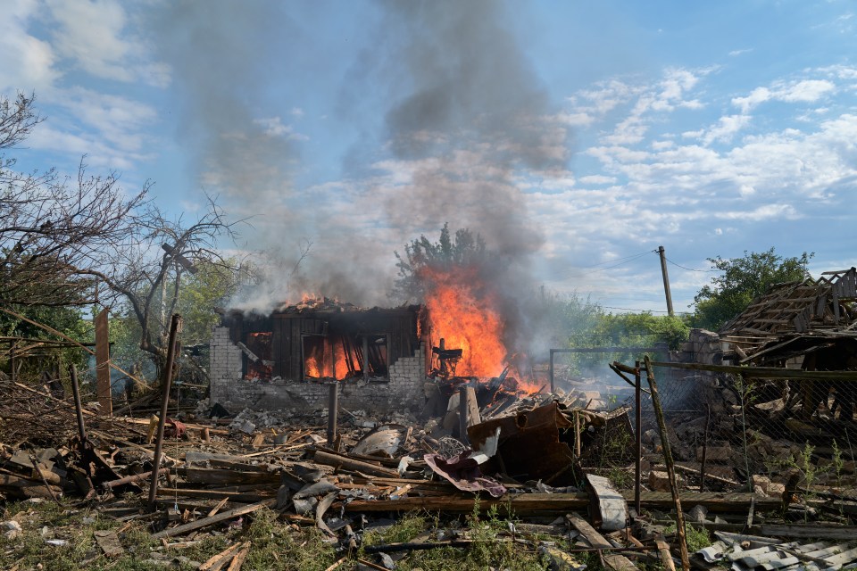 A house burning in Iverske, Ukraine, following a drone strike.