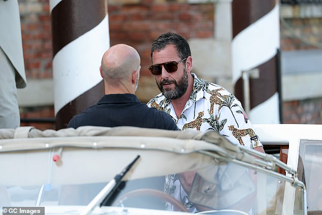 Adam was seen chatting in the speed boat