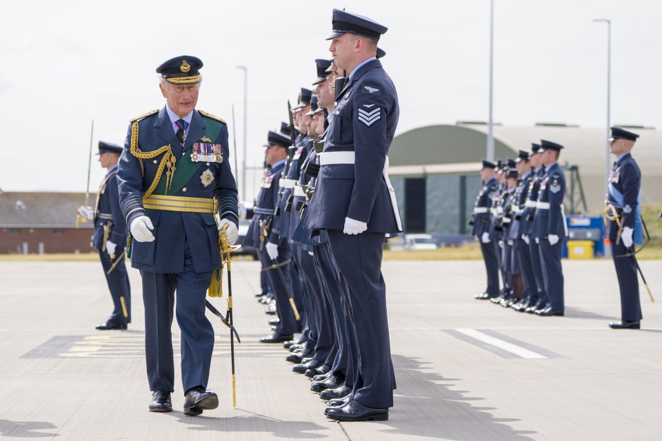 King Charles III inspecting members of the Royal Air Force.