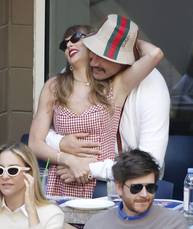 Mandatory Credit: Photo by John Angelillo/UPI/Shutterstock (14966598a) Taylor Swift and Travis Kelce embrace while Jannik Sinner of Italy and Taylor Fritz play in the men's singles finals in Arthur Ashe Stadium at the 2024 US Open Tennis Championships at the USTA Billie Jean King National Tennis Center in New York City on Sunday, September 8, 2024. UPI Pictures of the Year 2024 - SPORTS, New York, United States - 08 Sep 2024