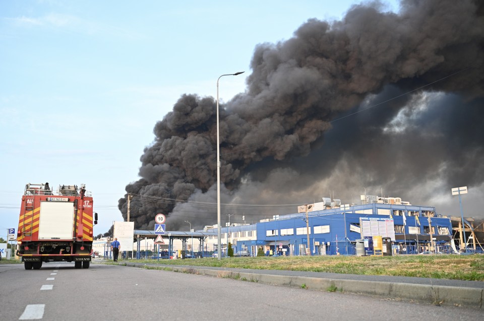 Firefighters battling a large fire at an electronics factory in Mukachevo, Ukraine.
