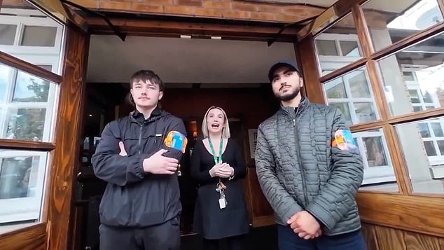 A senior member of staff arrived at the entrance and confirmed that the person recording the video must take off his England flag if he wants to be served