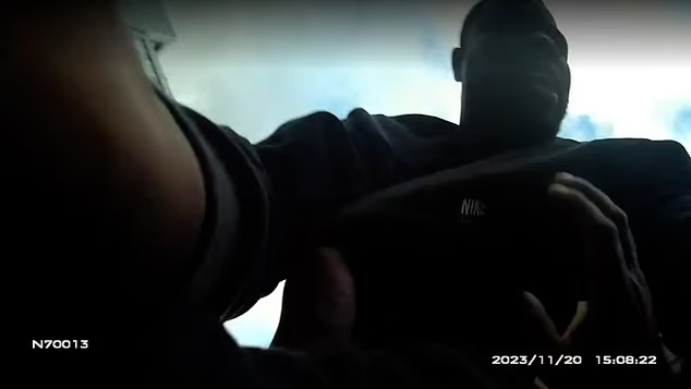 Bodycam footage of a traffic warden on the ground after being assaulted.