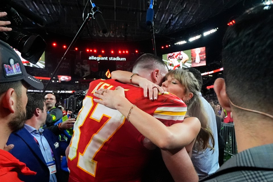 Taylor Swift embracing Travis Kelce after Super Bowl 58.