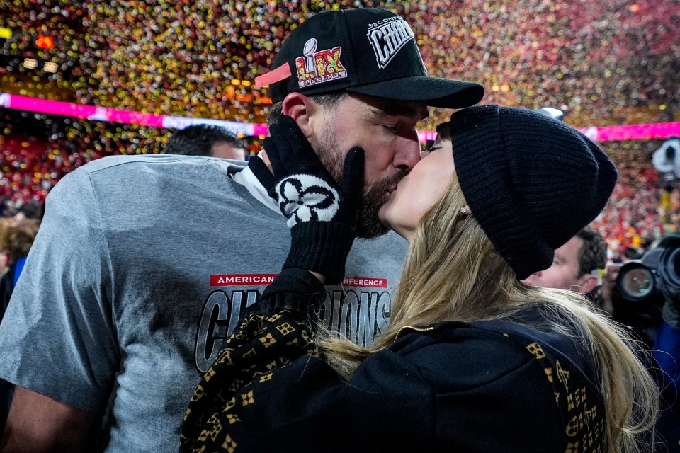 Travis Kelce and Taylor Swift kissing after an AFC Championship game.