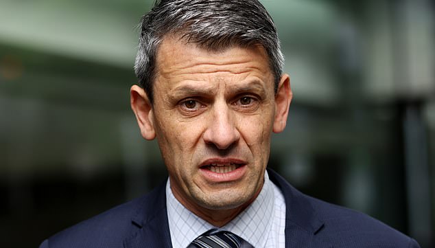 Police Association Secretary Wayne Gatt speaks to media ahead of Fair Work Commission hearing during a 30-minute work stoppage as part of industrial action concerning pay and conditions by Victoria Police in Melbourne, Monday, November 18, 2024. Melbourne police officers are staging a 30-minute work stoppage as part of industrial action concerning pay and conditions. (AAP Image/Con Chronis) NO ARCHIVING