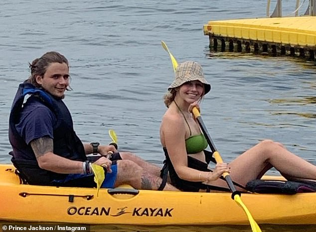 Prince's celebratory album was filled with photos of him and Molly through the years, kayaking together, enjoying a rainbow and posing at red carpet events