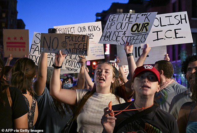 Arabella Advisors was recently found to be running several funds that are bankrolling Free DC's activism campaign protesting President Trump's deployment of the National Guard in the nation's capital. Protesters are seen carrying signs and shout slogans as they walk down U Street during an 'End the DC Occupation' rally on August 23