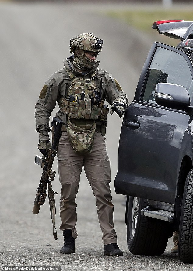 Heavily armed Special Operations Group officers are tasked with bringing Freeman to justice