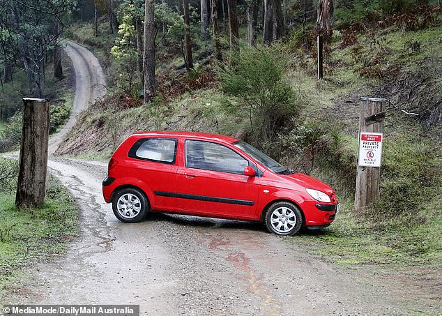 The entrance to Freeman's compound has been blocked by this red vehicle