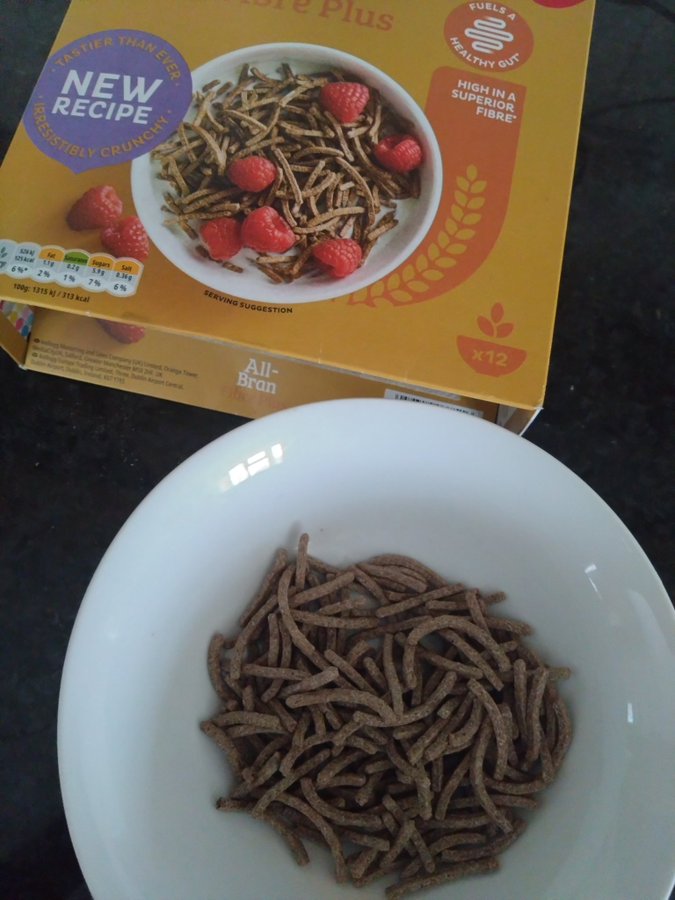 Kellogg's All-Bran cereal in a bowl and box.