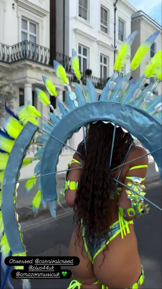 Woman in costume at Notting Hill Carnival.
