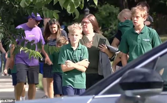 Children were being escorted out of the school and church by their parents