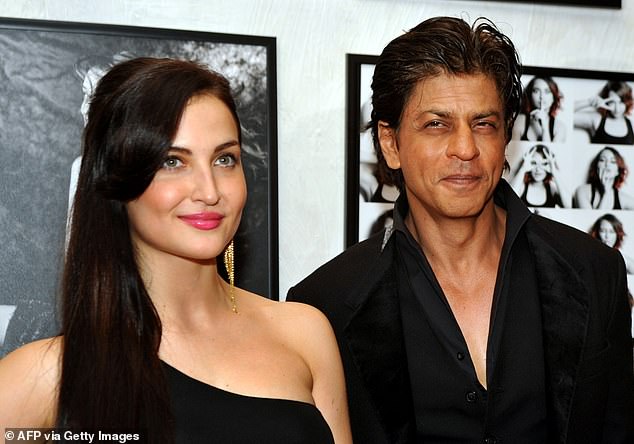 Experts told FEMAIL that Shah Rukh's skin texture has dramatically improved from before, as they highlighted a brighter, more youthful complexion from his earlier appearances - such as this media event in 2015