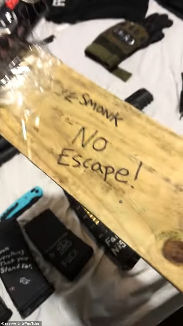 The video also showed pieces of wood with 'no escape' scrawled on them