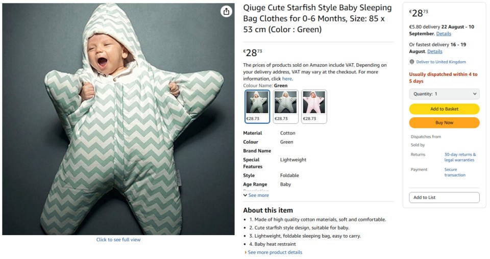 Baby in green starfish-shaped sleeping bag.
