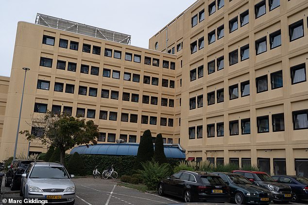 The suspect is an illegal unregistered migrant in his early 20s who was seized by a SWAT Team at a hostel for asylum seekers. Pictured: The A&0 hostel in Zuidoost