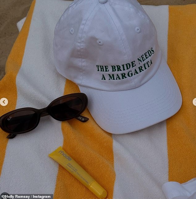 She also shared a photo of her white personalised baseball cap which read 'The Bride Needs A Margarita'