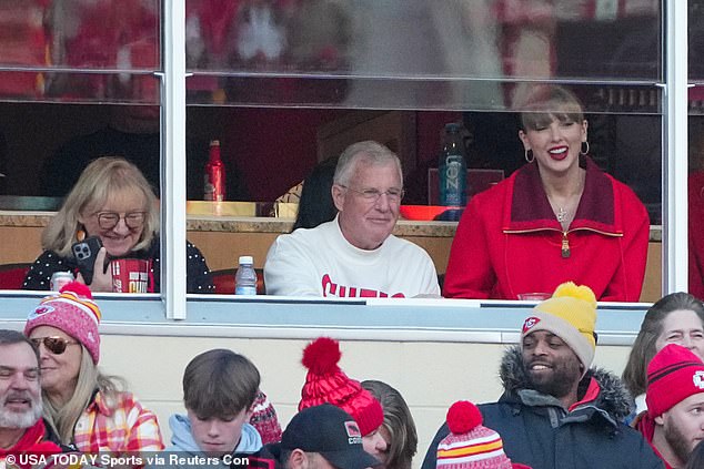 Donna is an impressive figure. she worked her way up from bank teller to finance executive and supported Travis and his NFL playing brother (Donna pictured with Taylor and her dad Scott)