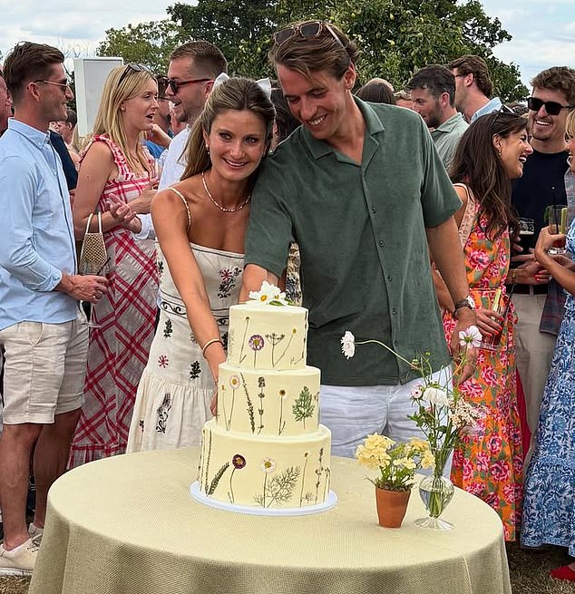 Annabel Croft's son, Charlie, and his new brige, Honour Wainwright, cutting the cake at their wedding