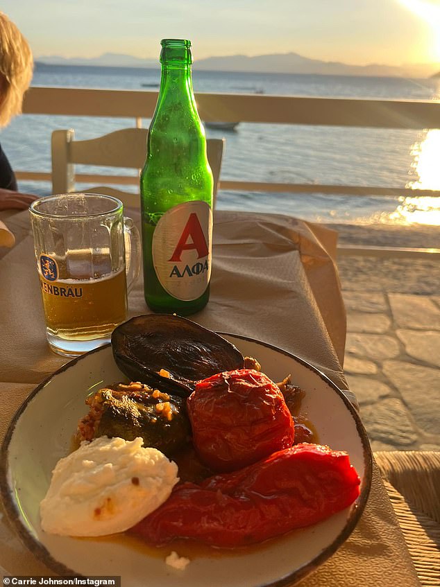 The family witnessed a beautiful sunset while enjoying dinner by the beach one evening