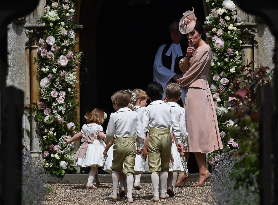 Kate Middleton at Pippa Middleton's wedding, shushing children.