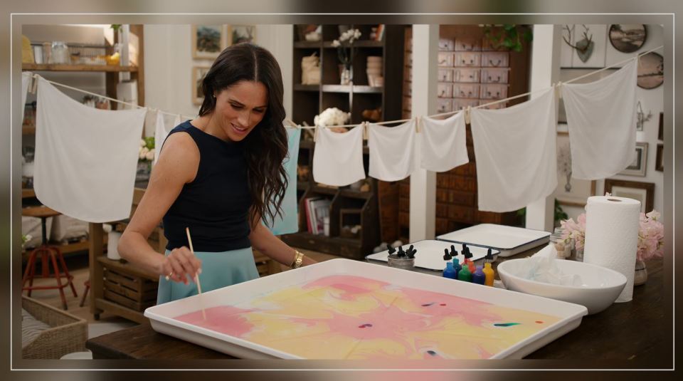 Meghan Markle creating marbled fabric.