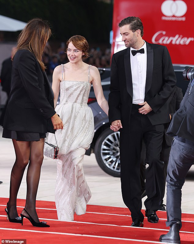 Emma was glowing as she arrived for the premiere arm-in-arm with her hubbie Dave