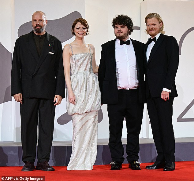 Greek director and screenwriter Yorgos Lanthimos, actress Emma, actor Aidan Delbis and actor Jesse Plemons pose on the red carpet