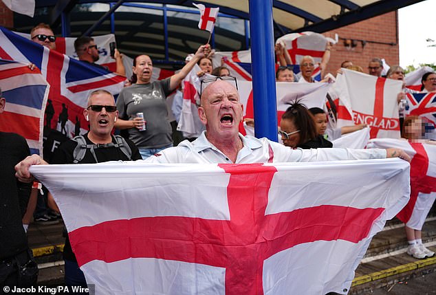 Pictured: anti-migrant protesters were seen in Birmingham on Sunday
